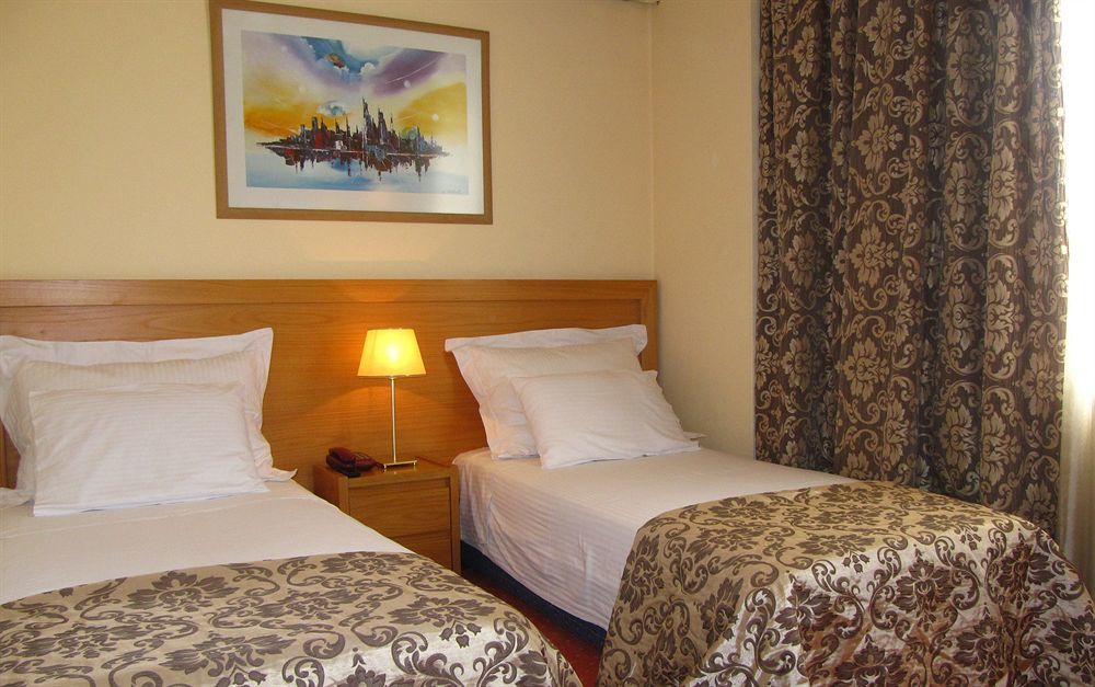 Hotel Doro City Тирана Экстерьер фото